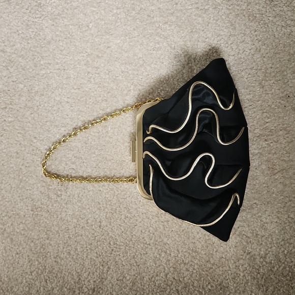 Black and gold Aldo Wristlet - Picture 1 of 3